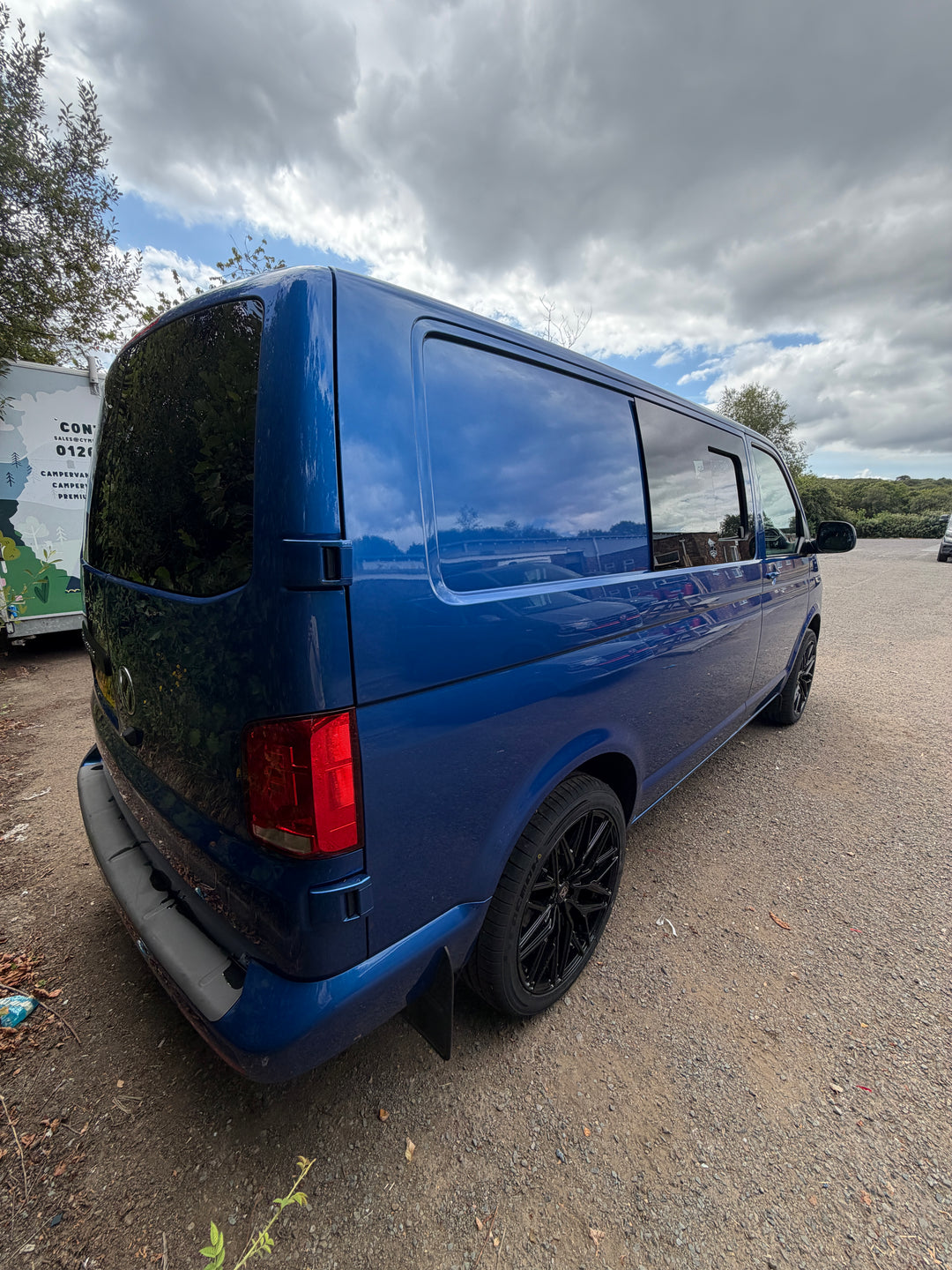 VW Transporter T6.1 SWB Highline T28 (2023) — Blue, Part-Converted
